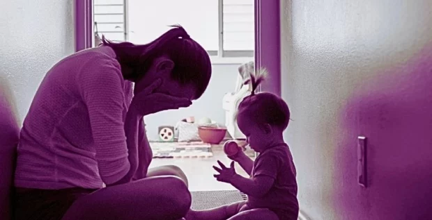 Silhouette of tired, stressed mother housewife taking care of child. Types of Child Support Enforcement